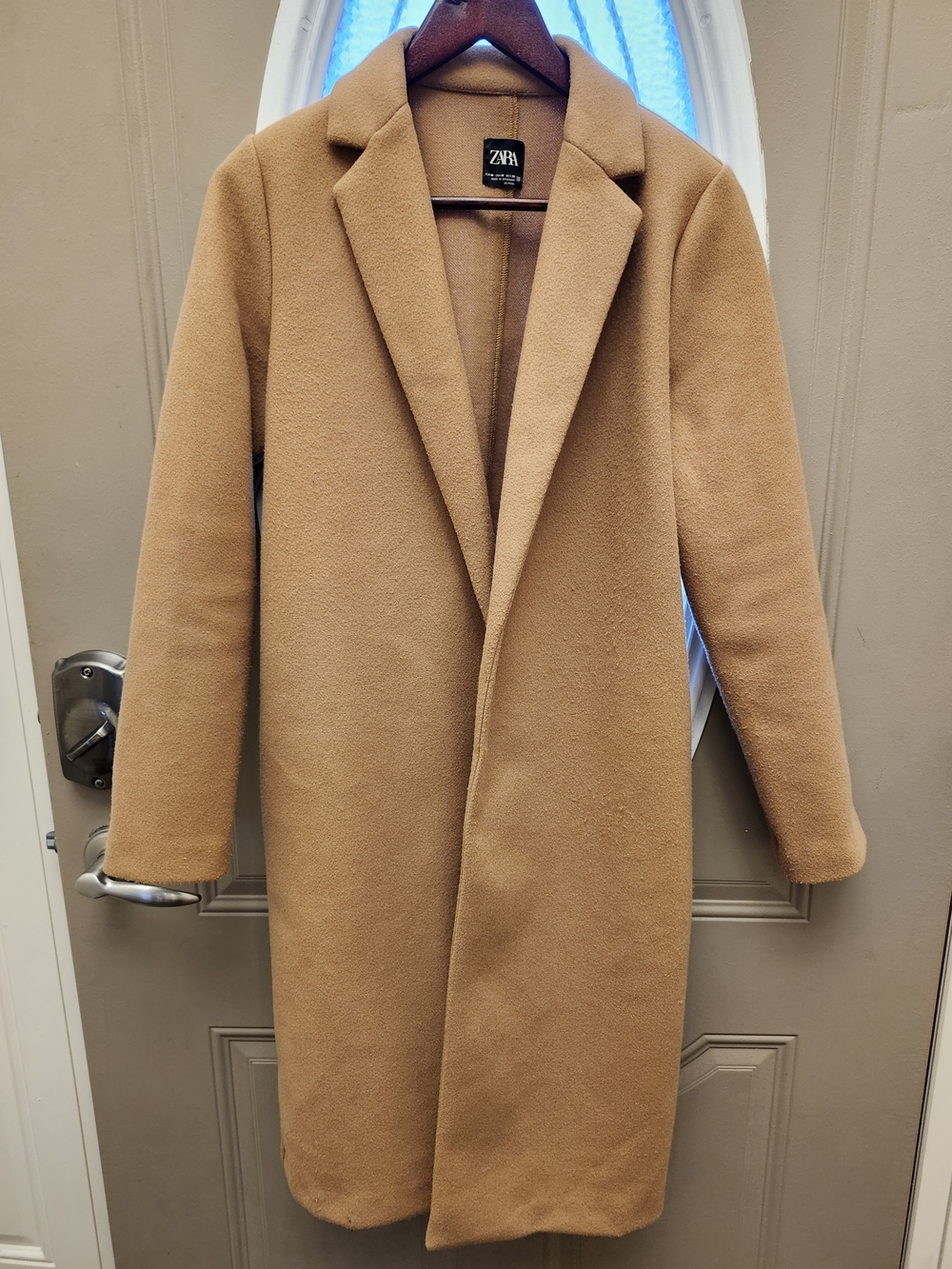 Zara Womens open-front long coat featuring a notched lapel collar in Camel